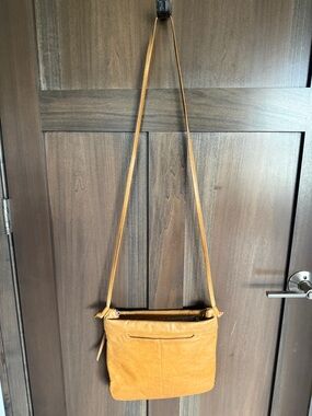 HOBO Leather Crossbody Bag in Mustard